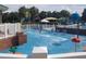 spray park with fun water features and seating at 19334 Autumn Woods Ave, Tampa, FL 33647