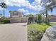 Two-story house with a spacious driveway and lush green lawn at 19334 Autumn Woods Ave, Tampa, FL 33647