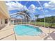 Inviting screened pool with ample deck space at 19334 Autumn Woods Ave, Tampa, FL 33647