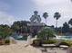 Community waterpark featuring a large water slide and a spacious pool at 19334 Autumn Woods Ave, Tampa, FL 33647