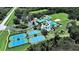 Community offers tennis courts and a clubhouse with pools at 19334 Autumn Woods Ave, Tampa, FL 33647
