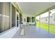 Covered side porch with decorative accents at 6048 Ridgeway Dr, Zephyrhills, FL 33542