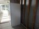 White refrigerator in an unfinished room at 6048 Ridgeway Dr, Zephyrhills, FL 33542
