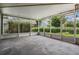 Large screened-in porch offers a comfortable outdoor living space at 6536 Northlake Dr, Zephyrhills, FL 33542