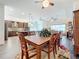 Bright dining room with a view of the kitchen and Gathering room at 15503 Corona Del Mar Dr, Wimauma, FL 33598