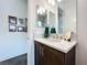 Small bathroom with single vanity and modern fixtures at 15503 Corona Del Mar Dr, Wimauma, FL 33598