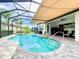 Spacious pool and spa with covered patio and retractable awning at 15503 Corona Del Mar Dr, Wimauma, FL 33598