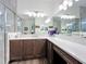 Bright bathroom with dual vanities and a large walk-in shower at 15503 Corona Del Mar Dr, Wimauma, FL 33598