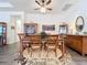 Spacious dining room with hardwood floors and a large table at 15503 Corona Del Mar Dr, Wimauma, FL 33598