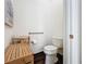 Small bathroom with toilet, shower, and grab bars at 15503 Corona Del Mar Dr, Wimauma, FL 33598
