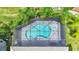 Bird's eye view of a refreshing pool and spa with screened enclosure at 15503 Corona Del Mar Dr, Wimauma, FL 33598