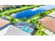 Private pool and spa, overlooking a serene lake at 15503 Corona Del Mar Dr, Wimauma, FL 33598
