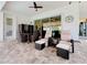 Spacious patio with wicker furniture and access to the pool at 15503 Corona Del Mar Dr, Wimauma, FL 33598