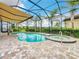 Relaxing pool and spa with covered patio and retractable awning at 15503 Corona Del Mar Dr, Wimauma, FL 33598