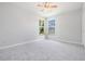 Spacious bedroom with neutral walls and carpeted floor at 6536 Northlake Dr, Zephyrhills, FL 33542