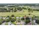 Aerial view of homes and golf course at 6536 Northlake Dr, Zephyrhills, FL 33542