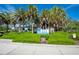 Welcome sign for Venice Beach with lush landscaping at 1555 Tarpon Center Dr # 136, Venice, FL 34285