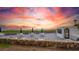 Beachfront patio with seating and ocean views at 1555 Tarpon Center Dr # 136, Venice, FL 34285