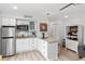 Charming galley kitchen, granite countertop, stainless steel appliances at 1555 Tarpon Center Dr # 136, Venice, FL 34285