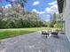 Spacious backyard with patio and seating area at 6902 E 29Th Ave, Tampa, FL 33619