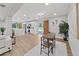 Modern kitchen with white cabinets and a marble island at 6902 E 29Th Ave, Tampa, FL 33619