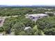 Property located near industrial area, surrounded by trees at 6902 E 29Th Ave, Tampa, FL 33619