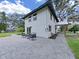 Cozy patio with seating area adjacent to house at 6902 E 29Th Ave, Tampa, FL 33619