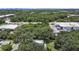 Property located near industrial area, surrounded by trees at 6902 E 29Th Ave, Tampa, FL 33619