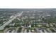 Aerial view of condo community near water and roads at 3439 Clark Rd # 239, Sarasota, FL 34231