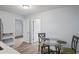 Small dining area with glass table and two chairs at 2395 19Th St, Sarasota, FL 34234
