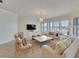 Bright living room with water views and comfortable seating at 5205 Brighton Shore Dr, Apollo Beach, FL 33572