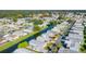 Aerial view of a community of mobile homes near a canal at 34051 Brown Byu, Wesley Chapel, FL 33543