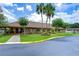Community building exterior with landscaping and parking at 34051 Brown Byu, Wesley Chapel, FL 33543