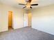 Simple bedroom with carpet floors and neutral walls at 34051 Brown Byu, Wesley Chapel, FL 33543