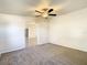 Spacious bedroom with carpet flooring and ceiling fan at 34051 Brown Byu, Wesley Chapel, FL 33543