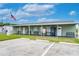 Community building exterior with parking and vending machines at 34051 Brown Byu, Wesley Chapel, FL 33543