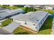 Mobile home with carport and landscaping at 34051 Brown Byu, Wesley Chapel, FL 33543