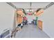 Garage with extra storage space and overhead shelving at 12971 Dream Catcher Way, Riverview, FL 33579