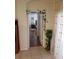 Bright hallway with hardwood floors leading to bedrooms at 20006 Nob Oak Ave, Tampa, FL 33647