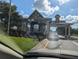 Gated community entrance with guardhouse and security features at 20006 Nob Oak Ave, Tampa, FL 33647