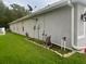 House side view, showing exterior and landscaping at 20006 Nob Oak Ave, Tampa, FL 33647