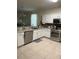 Updated kitchen with stainless steel appliances and granite countertops at 20006 Nob Oak Ave, Tampa, FL 33647
