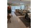Bright and airy living room with ample seating and large windows at 20006 Nob Oak Ave, Tampa, FL 33647