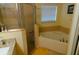 Spa-like bathroom with a soaking tub and shower at 20006 Nob Oak Ave, Tampa, FL 33647