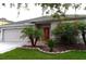 House exterior with landscaping at 20006 Nob Oak Ave, Tampa, FL 33647