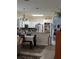 Open concept dining room adjacent to kitchen with breakfast bar at 20006 Nob Oak Ave, Tampa, FL 33647