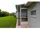 Screened patio with access to backyard at 20006 Nob Oak Ave, Tampa, FL 33647