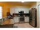 Spacious kitchen with stainless steel appliances and granite countertops at 20006 Nob Oak Ave, Tampa, FL 33647