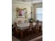 Bright dining room with wooden table and chairs at 20006 Nob Oak Ave, Tampa, FL 33647