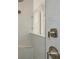 Elegant shower with gray tile and a glass partition wall, features a bench at 157 Hidden Estates Ct, Brandon, FL 33511